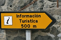 A sign for tourists and travelers